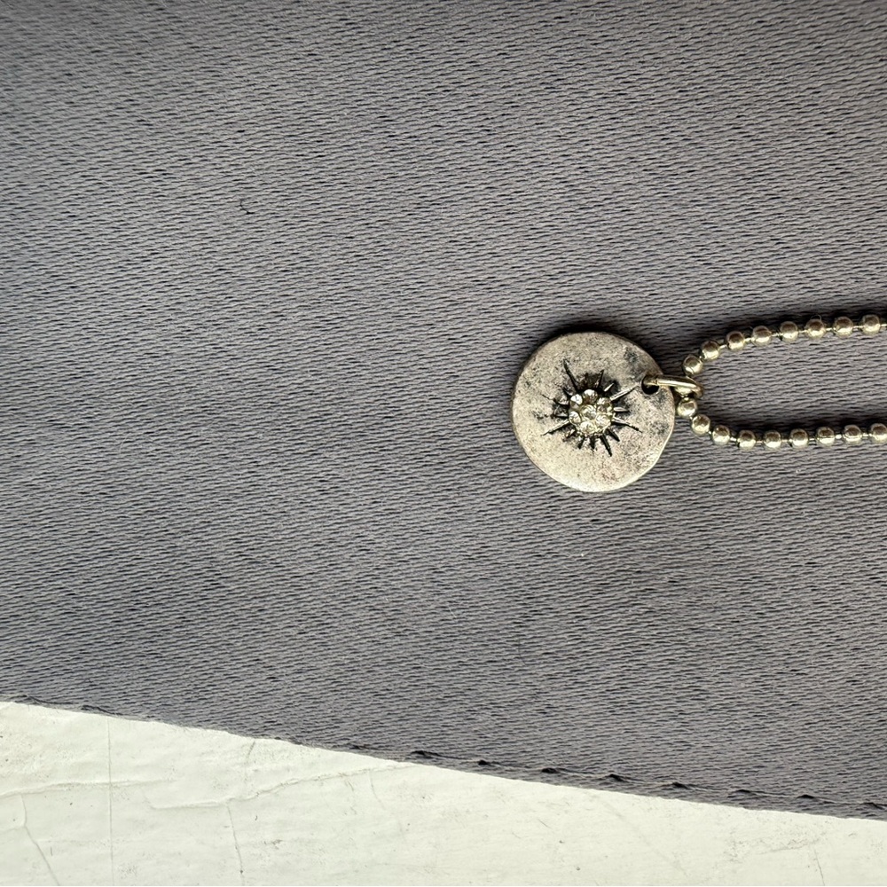 Silver Sunburst Pendant Necklace
